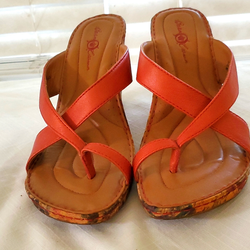 Born Crown size 9 dark orange, tan with multiple color wedge heel.